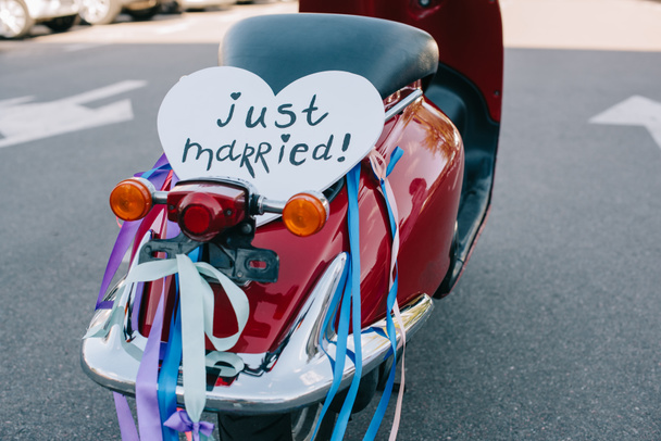 back view of scooter with ribbons and romantic "just married" heart sign  - Photo, Image