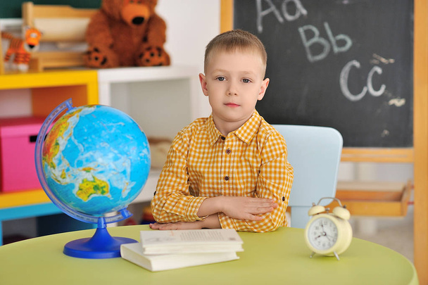 Portrait of a boy in the classroom. - Valokuva, kuva