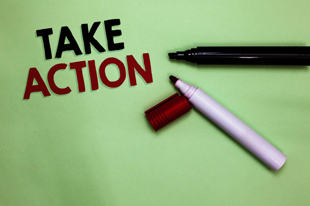 Text sign showing Take Action. Conceptual photo advices someone to do something or reaction right now Open markers Inspiration communicating ideas messages green background - Photo, Image