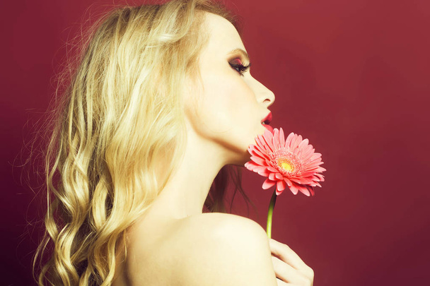 Sexy woman with flower - Foto, Bild