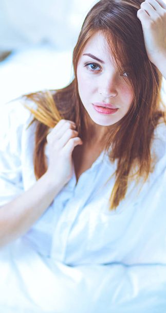 Portrait of beautiful young woman face. Isolated on white background. - Valokuva, kuva