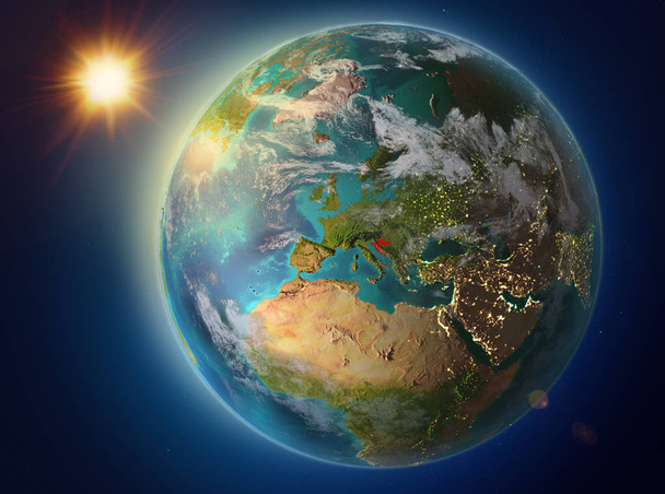 Puesta de sol sobre Croacia resaltada en rojo en el planeta Tierra con atmósfera y nubes. Ilustración 3D. Elementos de esta imagen proporcionados por la NASA
. - Foto, Imagen