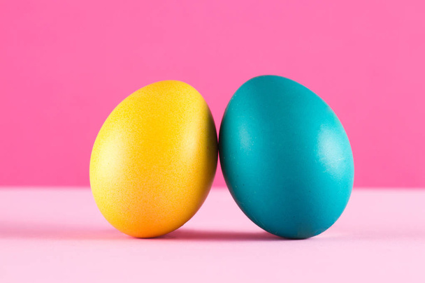 Colorful Easter eggs on the bright background - Фото, изображение