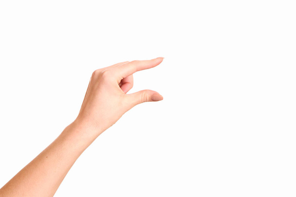 A mão mostrando o tamanho pequeno. Isolamento sobre fundo branco
 - Foto, Imagem