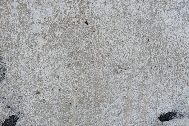 Wall fragment with scratches and cracks. It can be used as a background - Foto, Imagem