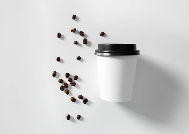 Cup of coffee on white. Branding element - Foto, imagen
