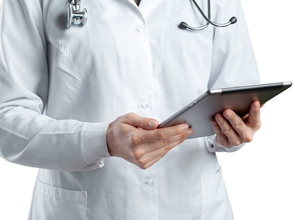 doctor using digital tablet, close up - Fotó, kép