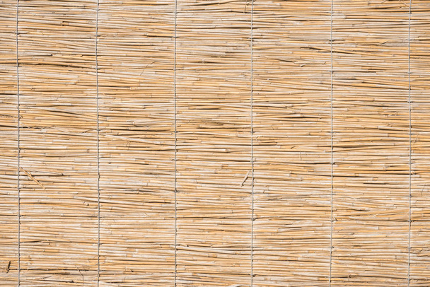 close-up view of light brown wicker background, full frame view - Foto, Imagem