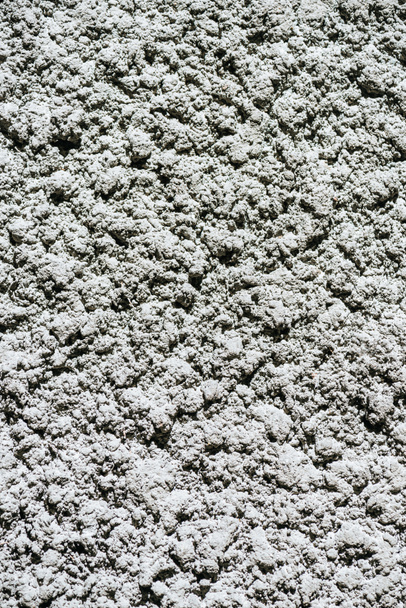 close-up view of old grey weathered concrete wall background - Foto, afbeelding