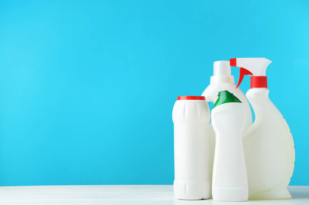 Bottles with detergent on wooden table - Φωτογραφία, εικόνα