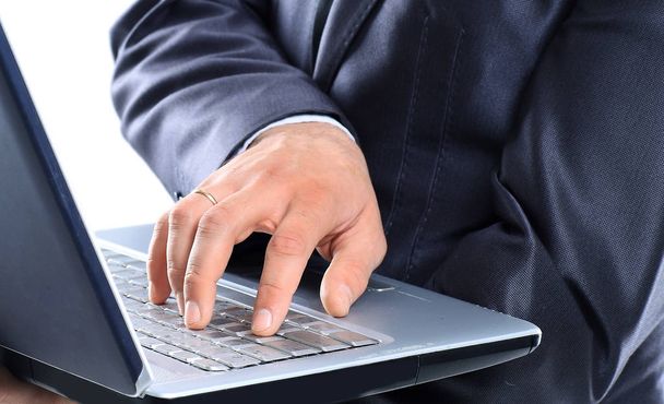 businessmans hand on keyboard with laptop on white background - Photo, image