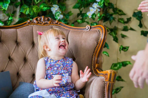 Portrait of funny little girl at home - Fotografie, Obrázek