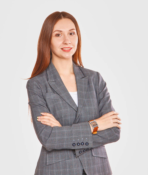 Smiling business woman. Isolated over white background. - Photo, Image