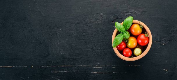 Cherry tomatoes. Top view. On the table. Free space for text. - Photo, image