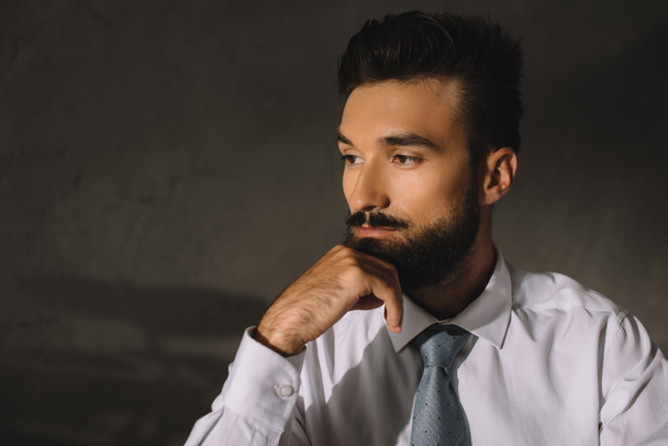 portrait of bearded pensive professional businessman  - Фото, изображение