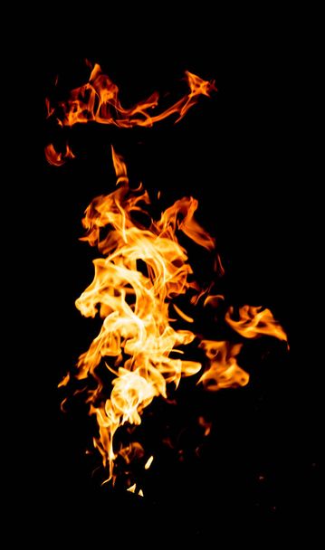red yellow flames on black background - Foto, Imagen