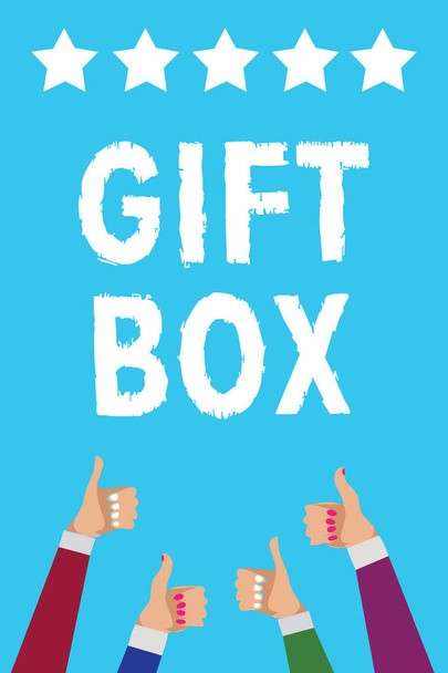 Writing note showing Gift Box. Business photo showcasing A small cointainer with designs capable of handling presents Men women hands thumbs up approval five stars info blue background - Photo, Image