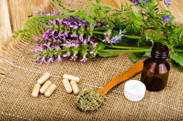 Natural herbal capsules from medicinal plants - Photo, Image