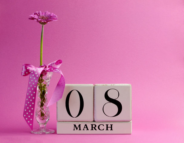 Pink theme calendar date for International Women 's Day
 - Фото, изображение