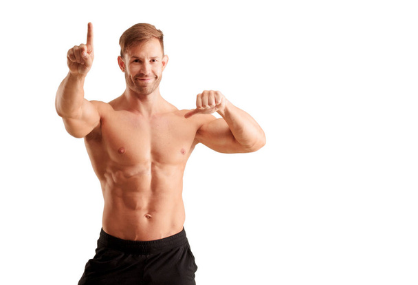 jovem fisiculturista bonito homem posando com aparência muscular
 - Foto, Imagem