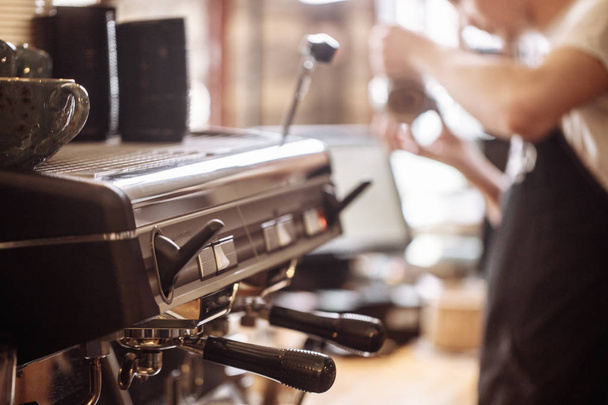 close up cropped photo of a modern coffee making machine - Foto, Bild