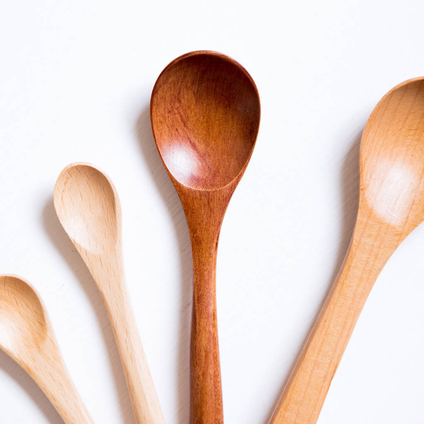 Wooden spoons on white background - Photo, Image
