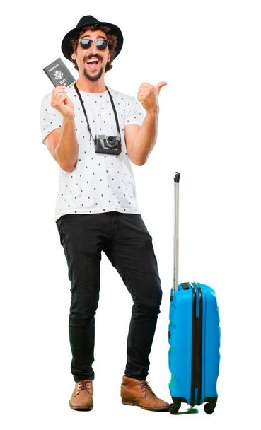 Young bearded cool traveller man with a bag. Holidays concept. - Foto, Imagem
