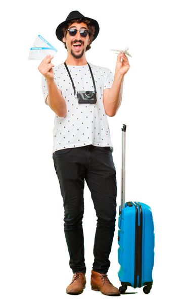 Young bearded cool traveller man with a bag. Holidays concept. - Fotoğraf, Görsel