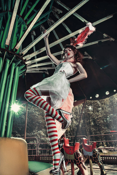 Circus girl in white dress on Carousel - Photo, Image