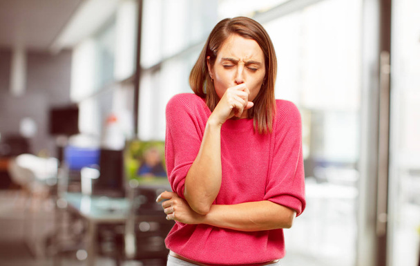 young woman full body. Coughing, suffering a winter illness such as a cold or the flu, feeling unwell and feverish. - Foto, Imagen