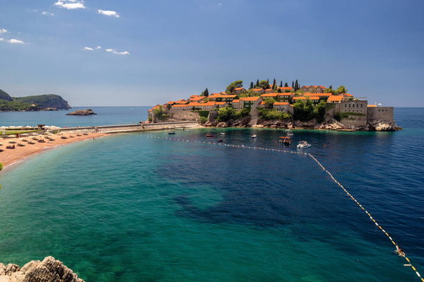 Sveti Stefan island in Budva in a beautiful summer day, Montenegro - Photo, Image