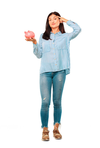young pretty woman with a piggy bank - Photo, image