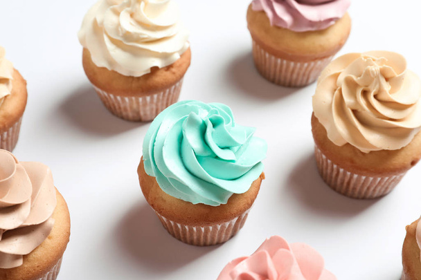 Delicious birthday cupcakes on white background, closeup - Valokuva, kuva