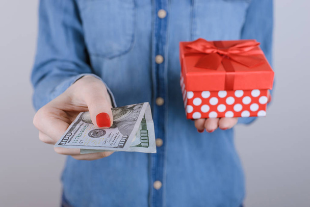 Discount sale win hold selfish consumerism people person beauty fashion friend red concept. Cropped close up photo portrait of excited glad lady buying getting present isolated on gray background - Photo, Image