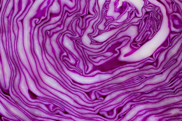Cut of purple cabbage close up. Top view - Photo, image