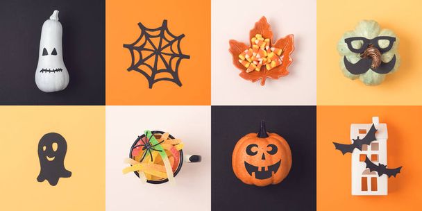 Halloween holiday concept with jack o lantern pumpkins and decorations. View from above. Flat lay - Fotó, kép