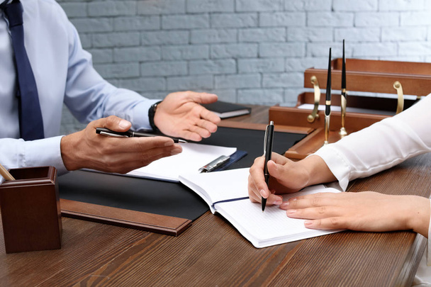Male lawyer with client at table in office - Photo, Image