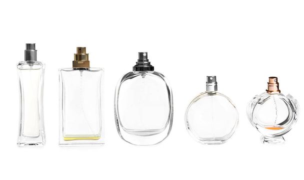 Different perfume bottles on white background - Valokuva, kuva