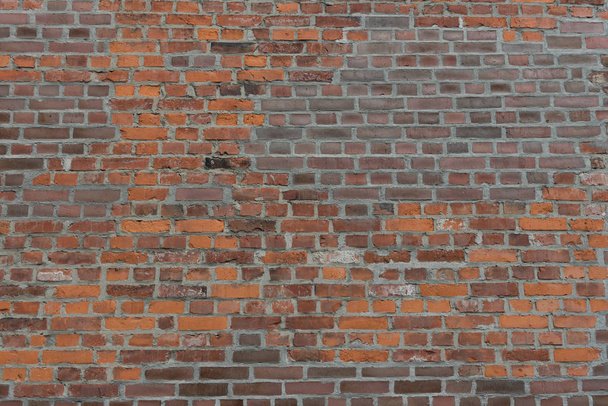 Old Red brick wall as background, wallpaper. Red bricks pattern, texture. Exterior wall. - Photo, Image
