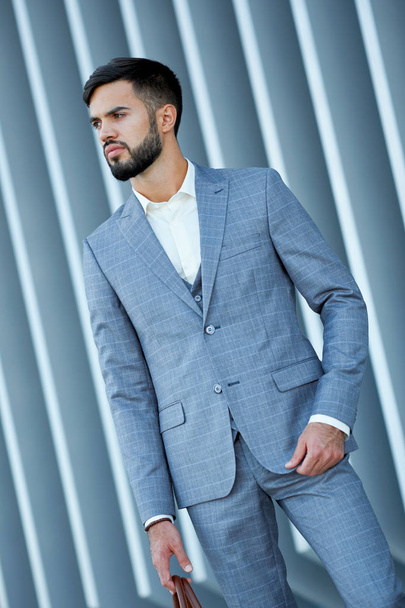 Businessman style. Men style. Man in custom tailored business suit posing outdoors - Zdjęcie, obraz