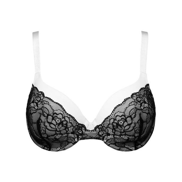 Black with white silk sexy push up brassiere isolated on white background. Women's expensive elegant underwear garment - Фото, зображення