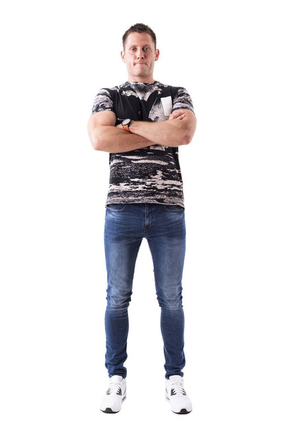Confident proud casual young adult man with crossed arms looking at camera. Full body isolated on white background. - Fotoğraf, Görsel