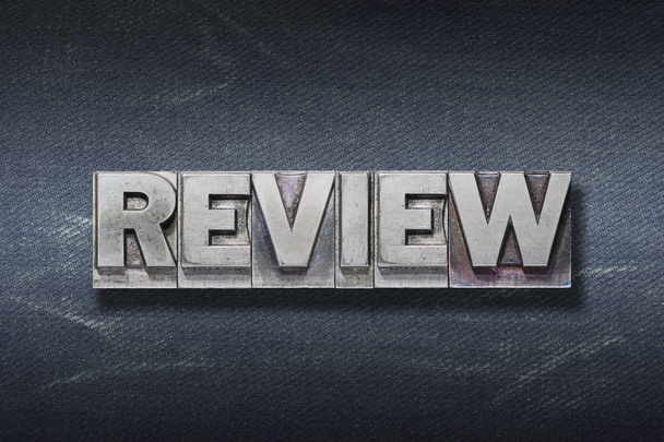 review word made from metallic letterpress on dark jeans background - Photo, Image