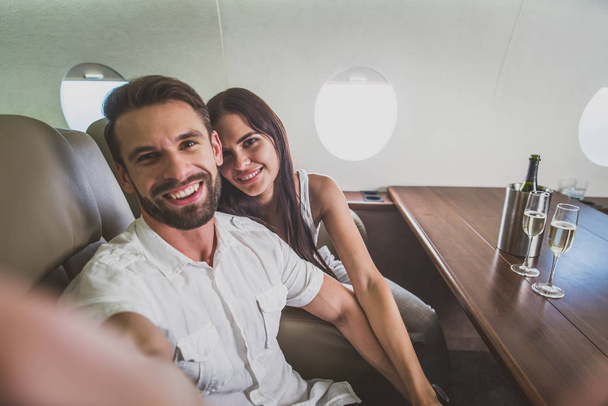 Couple on vacation, flying on their private jet - Foto, Imagem