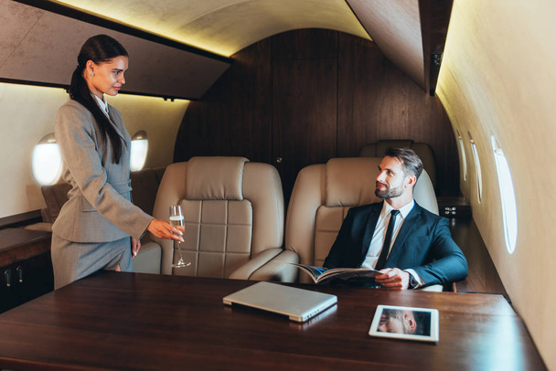 Businessman flying on his private jet - Fotó, kép