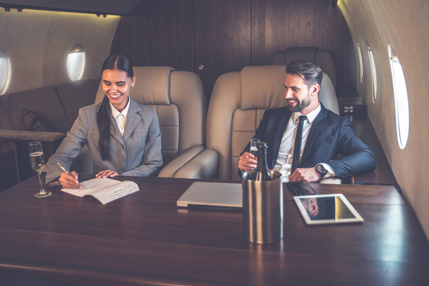 Business team on the private jet - Фото, изображение