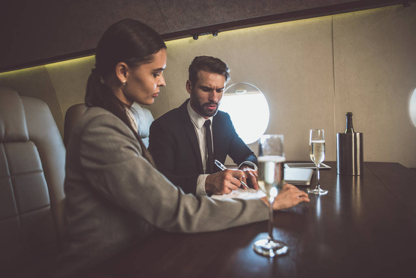 Business team on the private jet - 写真・画像