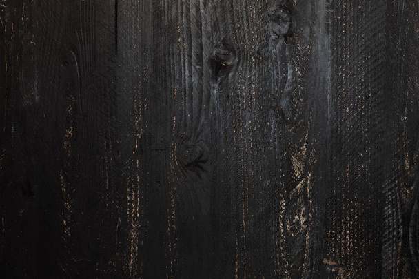 Natürliche Textur aus altem schwarzem Holz zum Hinzufügen von Text, Grafikdesign und Darstellung oder Montage Ihres Produkthintergrundes - Foto, Bild