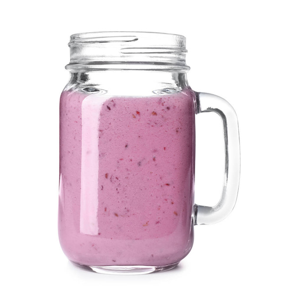 Mason jar with blackberry yogurt smoothie on white background - Fotoğraf, Görsel