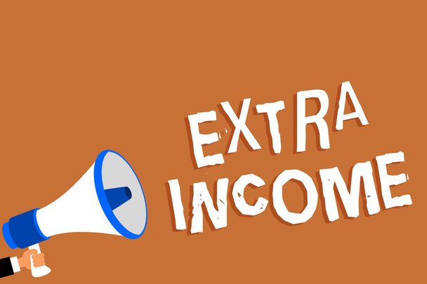 Text sign showing Extra Income. Conceptual photo Additional fund received or earned from a non regular basis Man holding megaphone loudspeaker orange background message speaking loud - Photo, Image